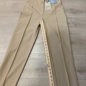 Theo The Label Women's Tan  pleated Trousers pants